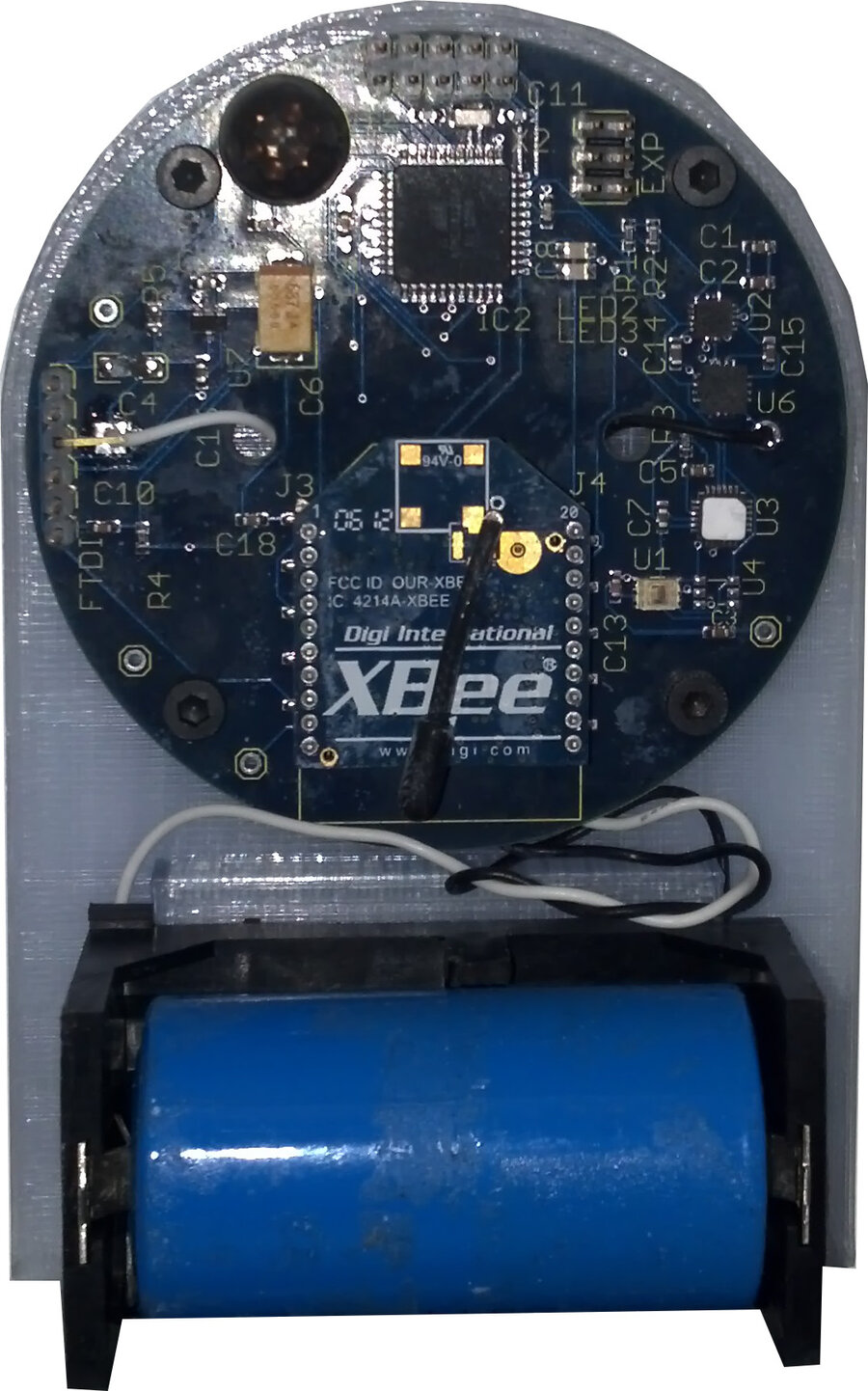 Open battery-powered indoor environmental sensor board with a WiFi radio module and a single 18650 lithium cell.